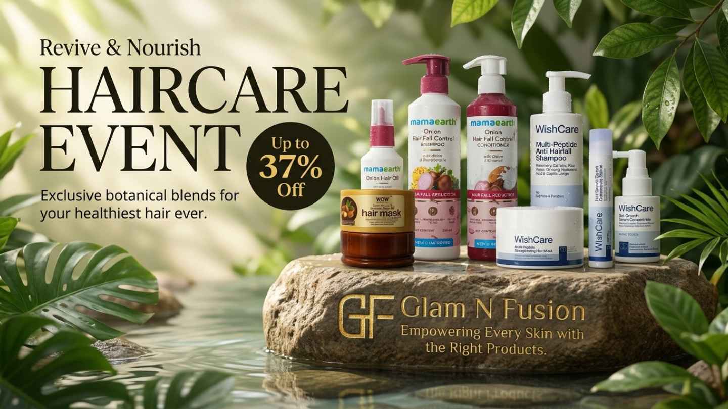 Mamaearth and WishCare hair fall control shampoos, masks, and serums displayed on a natural stone plinth with botanical leaves for the Haircare Event.